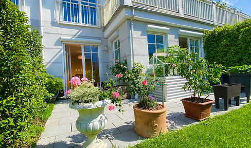 Haus-im-Haus in Stadtvilla:  3-Zimmer-Gartenwohnung mit Südterrasse, Privatgarten, Energiek A und TG