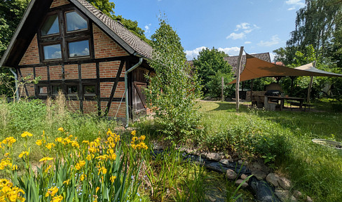 Commission-free: A unique four-building farm complex with a main house and barn.
