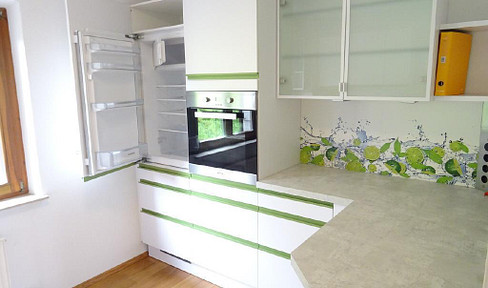 Bright 2-room apartment with fitted kitchen and balcony.