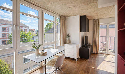 Bright, compact rental apartment with a balcony, fitted kitchen, and built-in furniture, located in Frankfurt-Bockenheim.