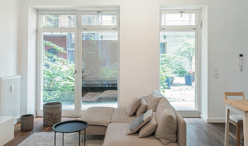 Modern living in the Grussank Höfen II – Studio apartment with terrace.