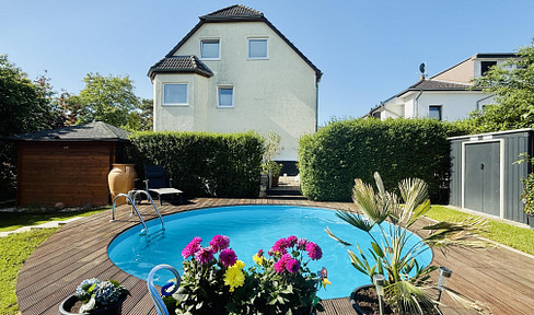 Modern maisonette apartment with garden, terrace, pool, and conservatory.