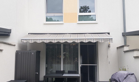 Dream townhouse in a prime location, with a garden and parking spaces.