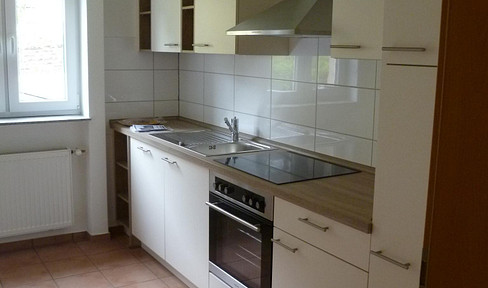 Beautiful 3-room apartment with fitted kitchen and balcony.