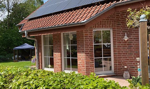 Energy-efficient single-family home (A+) with a ground source heat pump and solar panels, located in a quiet area of Spenge.