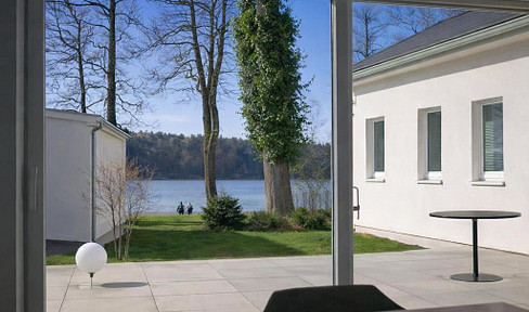 A dream home by the lake, near Berlin, with a guest house, sauna, and a private pier.