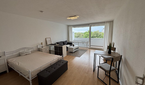 Furnished one-bedroom apartment with a balcony, swimming pool, and sauna.