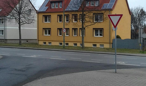 Multi-family house with 6 residential units and a photovoltaic (PV) system.