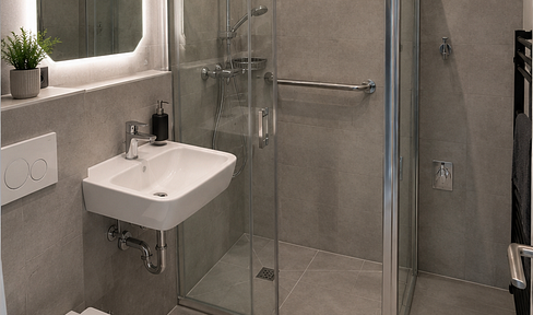 5.5% return on investment after renovation: Modern 1-bedroom apartment with balcony.