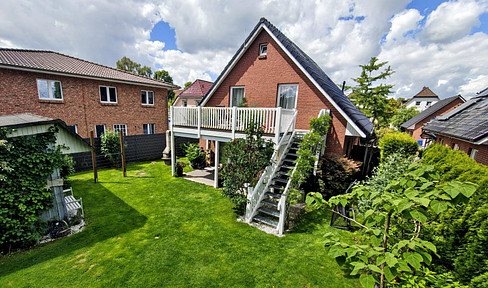 Modern red brick house with a new gas-hybrid heating system installed in 2026.
