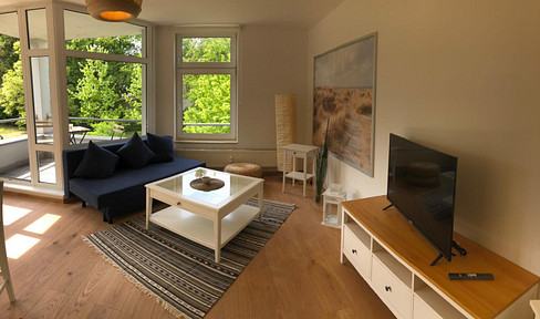 Quiet, bright, and furnished apartment with a balcony, offering excellent transport links between Adlershof and BER airport.