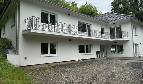 Completely renovated two-family house in a picturesque location.