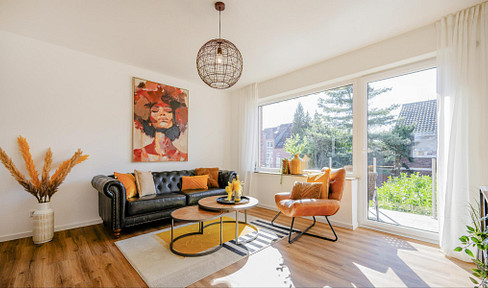 Detached two-family house with two identical apartments, a garden, a terrace, and a balcony.