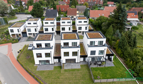 Modern townhouse with a garage, available for first occupancy, 3 stories.