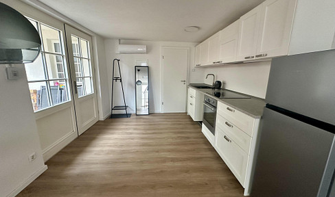 Modern maisonette apartment with its own entrance, terrace, and high-quality fitted kitchen.