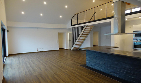 Live like you're in a penthouse: Featuring a gallery, fireplace, and a huge living area.