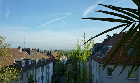Charmante lichtdurchflutete  Eigentumswohnung mit Dachterrasse in Südlage