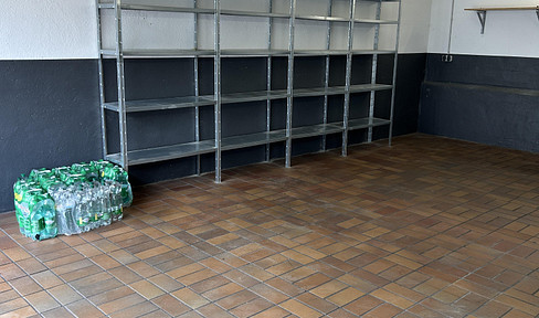 Large garage and additional outdoor parking space.