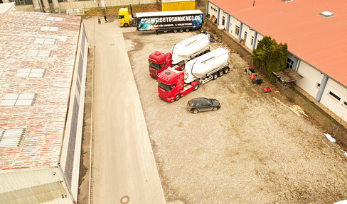 Parking space for motorhomes and caravans, with electrical hookup.