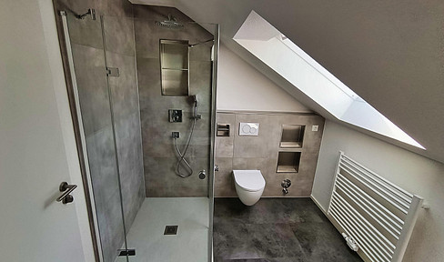 2-room attic apartment in Baindt - completely renovated - with views of the Alps.