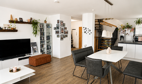 145 square meters of living space spread over two levels, featuring 3 bedrooms, 2 bathrooms, and 2 parking spaces in the underground garage.