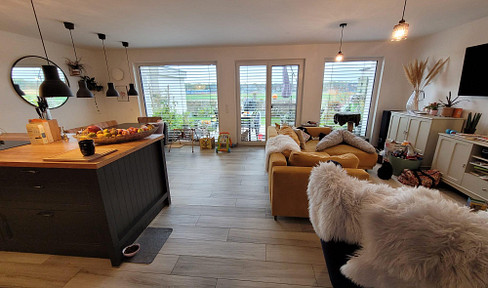 Charming 3-room ground floor apartment with a garden, located in a quiet area on the edge of a field.
