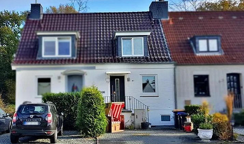 For rent: A house with a garden and parking space, located on a quiet street in Timmendorfer Strand, just 400 meters from the beach.