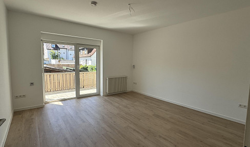Private garden! Beautiful, bright 2-room apartment with a garden, balcony, and parking space.