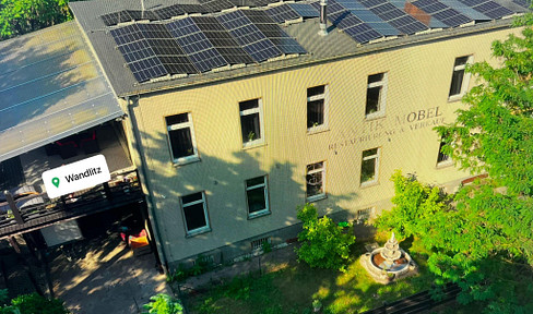 Residential and commercial property with building land, a photovoltaic system, and significant potential.