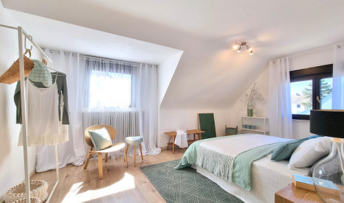 Spacious 5.5-room maisonette apartment with a house-like feel and plenty of space for the family.
