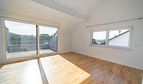 Exclusive maisonette apartment with a "house within a house" feel, featuring a garden, rooftop loggia, and garage, located in Pfaffendorf.