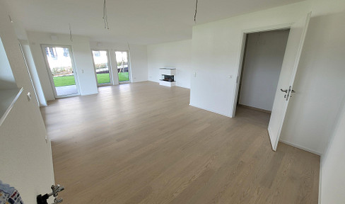 MODERN LIVING WITH A GARDEN - STYLISH, NEWLY BUILT GROUND-FLOOR APARTMENT WITH A SOUTHERLY EXPOSURE AND AMPLE SUNLIGHT.
