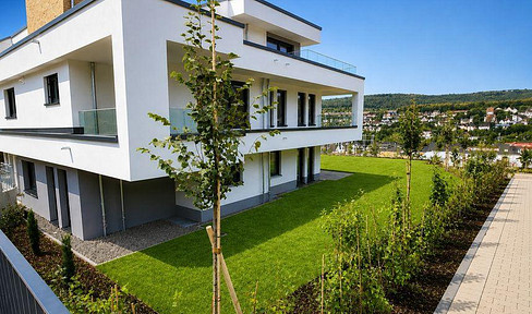 MODERNE ARCHITEKTUR TRIFFT AUF WOHNKOMFORT,   Exclusive Erdgeschosswohnung mit Garten