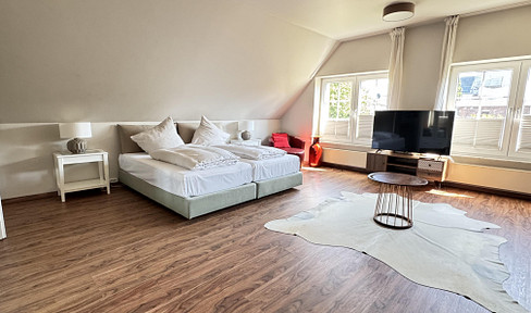 Business rooms with private bathrooms, terraces, parking, and various service options, conveniently located near Cologne.