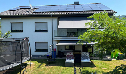 Modernized detached house with a separate apartment, courtyard, and garden, featuring a solar power system.