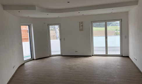 Exklusive 2-Zimmer-Wohnung mit 31 m² Südwestbalkon, Aufzug & Tiefgarage – KfW-55-Effizienzhaus