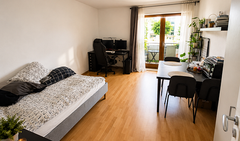 One-bedroom apartment with balcony and underground parking.
