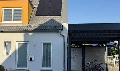 Family-friendly semi-detached house with a photovoltaic system.