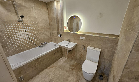 Exklusive 2-Zimmer-Wohnung mit Balkon und Einzelgarage – Erstbezug nach hochwertiger Renovierung