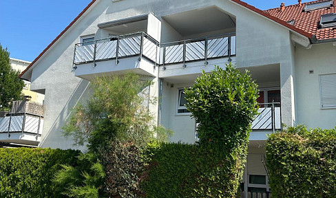 Commission-free: 4.5-room maisonette apartment with a balcony and 2 underground parking spaces.