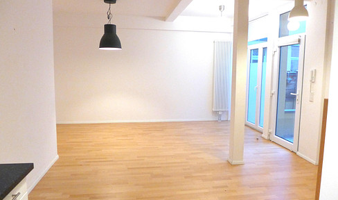 Charming 2.5-room maisonette apartment with a terrace and balcony.