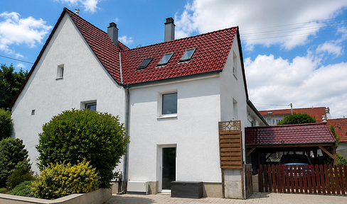 5-unit apartment building with development potential for sale.