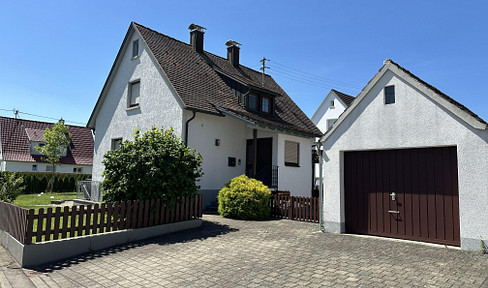 Familienhaus mit Traumgarten, neuer Heiztechnik, großer Garage & Ausbaupotenzial in ruhiger Lage