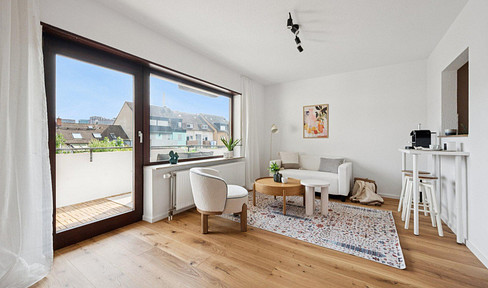 City in the front, green gardens in the back – 2-room apartment in Neckarau with a balcony.