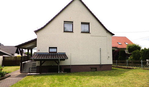 Unter 150.000 €: 131 m² Familienhaus mit 4 Schlafzimmern, 2 Bädern & 2 Garagen – provisionsfrei