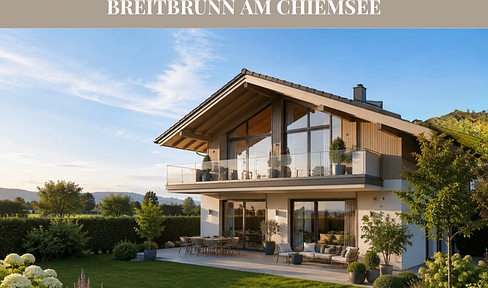 Sunny building plot on Lake Chiemsee - with mountain views, versatile development possibilities, and building permit.