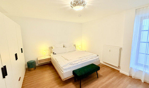 First occupancy of an exclusive, renovated, and furnished 2-room apartment on the ground floor in the center of Erlangen.
