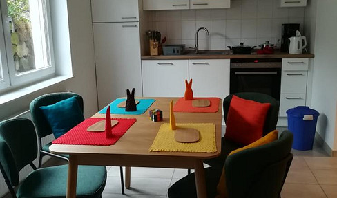All-inclusive 2-room apartment, 54 square meters, centrally located in Bonn, with a modern, minimalist design.