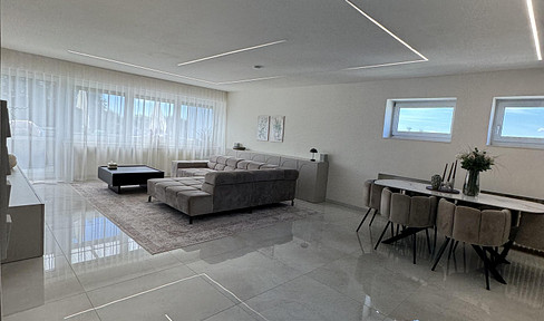 Modernized 4-room apartment | 121.5 m² | Garage | 2 balconies | Kitchen with island | Cellar | Excellent location.