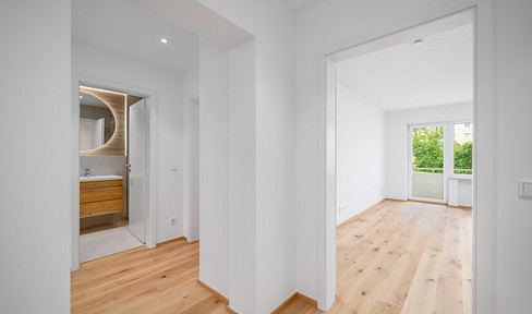Erstbezug nach Modernisierung: Helle 3-Zimmer-Wohnung mit Sonnenbalkon in ruhiger Grünlage
